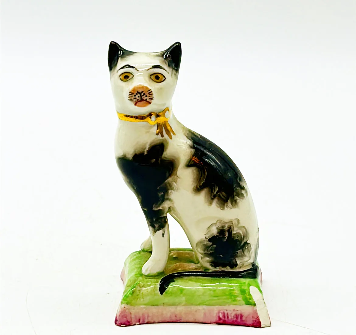 Antique signed Staffordshireware England and numbered kitty figure