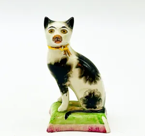 Antique signed Staffordshireware England and numbered kitty figure